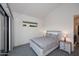 Bright bedroom with neutral decor, a comfortable bed, and ample natural light at 1 Easy St # 17, Carefree, AZ 85377