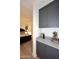 This room features a convenient coffee bar with sleek gray cabinetry and stylish countertops at 1 Easy St # 17, Carefree, AZ 85377