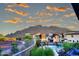 Beautiful community pool nestled against a desert mountain backdrop at sunset at 1 Easy St # 17, Carefree, AZ 85377