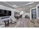 Bright living room with modern kitchen, comfortable seating, and dining space at 1 Easy St # 17, Carefree, AZ 85377