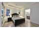 Serene main bedroom with wood floors, accent lighting, and ensuite bathroom at 1 Easy St # 17, Carefree, AZ 85377