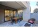 Stylish patio with a dining table, chairs, and fire pit, perfect for outdoor gatherings and relaxation at 1 Easy St # 17, Carefree, AZ 85377