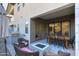 Outdoor patio featuring a dining table, fire pit, grill, and seating area, perfect for entertaining guests at 1 Easy St # 17, Carefree, AZ 85377
