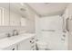 Bright bathroom with white vanity, modern fixtures, and an accessible shower-tub combo at 10330 W Thunderbird Blvd # B112, Sun City, AZ 85351