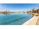 Beautiful view of the large community lake and landscaping on a bright, sunny day at 10330 W Thunderbird Blvd # B112, Sun City, AZ 85351