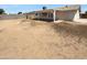 Spacious backyard featuring a covered patio perfect for outdoor living at 10831 W Heatherbrae Dr, Phoenix, AZ 85037