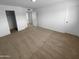 Bedroom with neutral carpet, closet, and neutral colored walls at 10831 W Heatherbrae Dr, Phoenix, AZ 85037