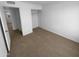 Bedroom features neutral carpet, closet, and neutral colored walls at 10831 W Heatherbrae Dr, Phoenix, AZ 85037