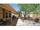 Inviting back patio with an open seating area and desert landscaping at 116 E Mountain Sky Ave, Phoenix, AZ 85048