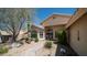 Charming single-story home with a manicured desert landscape and a tile roof at 116 E Mountain Sky Ave, Phoenix, AZ 85048