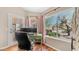 Inviting home office with a view, a modern desk, and a comfortable executive chair at 116 E Mountain Sky Ave, Phoenix, AZ 85048