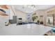 Well-lit kitchen showcasing custom cabinetry, desert views, and a spacious layout at 116 E Mountain Sky Ave, Phoenix, AZ 85048