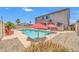 Backyard oasis featuring a swimming pool, and comfortable seating, perfect for relaxation at 11952 W Villa Chula Ln, Sun City, AZ 85373