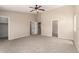Large bedroom featuring multiple closets and neutral color paint at 12274 W Monroe St, Avondale, AZ 85323