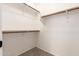 Walk-in closet features custom shelving for optimal storage space at 12274 W Monroe St, Avondale, AZ 85323