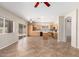 A well lit Kitchen, with light wood cabinets, stainless steel appliances and a kitchen island at 12274 W Monroe St, Avondale, AZ 85323