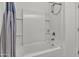 Bright bathroom featuring a clean, white shower and tub combination at 12375 W Whyman Ave, Avondale, AZ 85323