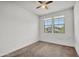 Bedroom with carpet, neutral walls, ceiling fan, and double windows at 12375 W Whyman Ave, Avondale, AZ 85323