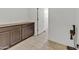 Mudroom with lower dark cabinets and tiled floors at 12375 W Whyman Ave, Avondale, AZ 85323
