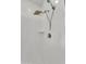 Modern shower stall with rainfall shower head and sleek chrome fixtures, complete with shelf at 12375 W Whyman Ave, Avondale, AZ 85323