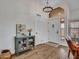Welcoming entryway with laminate wood flooring and high ceiling at 12641 S 39Th Pl, Phoenix, AZ 85044