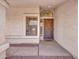 The entryway has a security door, tiled floor and nice lighting at 12641 S 39Th Pl, Phoenix, AZ 85044