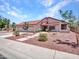 Inviting single-story home with a red tile roof and desert landscaping, perfect for curb appeal at 12641 S 39Th Pl, Phoenix, AZ 85044