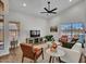 Bright living room with high ceilings, hardwood floors, and large windows at 12641 S 39Th Pl, Phoenix, AZ 85044