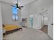 Comfortable main bedroom with high ceilings, and ensuite bathroom at 12641 S 39Th Pl, Phoenix, AZ 85044
