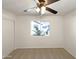 Bedroom featuring carpet flooring and a view from the window at 1415 E Chipman Rd, Phoenix, AZ 85040