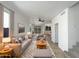 Inviting living room featuring neutral tones, plush seating, and stylish decor at 1415 E Chipman Rd, Phoenix, AZ 85040