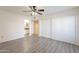 Spacious bedroom featuring modern flooring and a large closet at 1446 E Grovers Ave # 13, Phoenix, AZ 85022