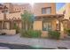 Attractive townhomes with manicured landscaping, desert landscaping, covered entries and two parking spaces at 1446 E Grovers Ave # 13, Phoenix, AZ 85022