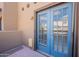 Patio with blue french doors at 1446 E Grovers Ave # 13, Phoenix, AZ 85022
