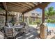 Cozy covered patio with a dining set, perfect for outdoor entertaining and relaxation at 1446 E Grovers Ave # 13, Phoenix, AZ 85022