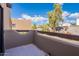 Outdoor patio view looking at desert landscaping and blue sky at 1446 E Grovers Ave # 13, Phoenix, AZ 85022