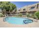 Inviting community pool with spa and lounge area, ideal for relaxation and socializing at 1446 E Grovers Ave # 13, Phoenix, AZ 85022