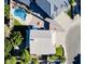 Overhead view highlighting the house layout, pool, landscaping, and neighborhood streets at 25015 N 50Th Ave, Phoenix, AZ 85083
