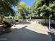 Spacious backyard featuring a fireplace, built-in grill, and basketball hoop, ideal for entertaining at 25015 N 50Th Ave, Phoenix, AZ 85083