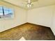 Cozy bedroom with carpet flooring and neutral walls offers a relaxing retreat at 25015 N 50Th Ave, Phoenix, AZ 85083