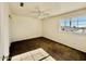 Bright bedroom featuring carpet flooring and large window for natural light and comfortable living at 25015 N 50Th Ave, Phoenix, AZ 85083