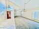Welcoming entryway with tile flooring, high ceilings, and elegant lighting fixtures exudes sophistication at 25015 N 50Th Ave, Phoenix, AZ 85083