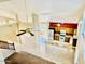 Bright kitchen featuring stainless steel refrigerator, granite counters, and ample cabinet space at 25015 N 50Th Ave, Phoenix, AZ 85083