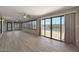 Large sunroom featuring tile flooring, multiple windows, and ceiling fans, perfect for indoor-outdoor living at 26649 S Howard Dr, Sun Lakes, AZ 85248