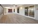 Bright sunroom features tile floors, fan, and multiple windows, providing a versatile space for various activities at 26649 S Howard Dr, Sun Lakes, AZ 85248