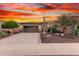 Charming home featuring a desert landscape, two car garage and a long concrete driveway at 28878 N 127Th Ln, Peoria, AZ 85383