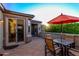 Outdoor patio area with table, chairs, and open views at 28878 N 127Th Ln, Peoria, AZ 85383