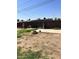 Backyard featuring a low block wall with grassy areas at 3211 W Campbell Ave, Phoenix, AZ 85017