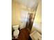 Functional bathroom features tiled walls, a shower, and a modern vanity at 3211 W Campbell Ave, Phoenix, AZ 85017
