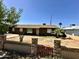 Inviting single-story home with updated windows and a unique brick and stone wall at 3211 W Campbell Ave, Phoenix, AZ 85017
